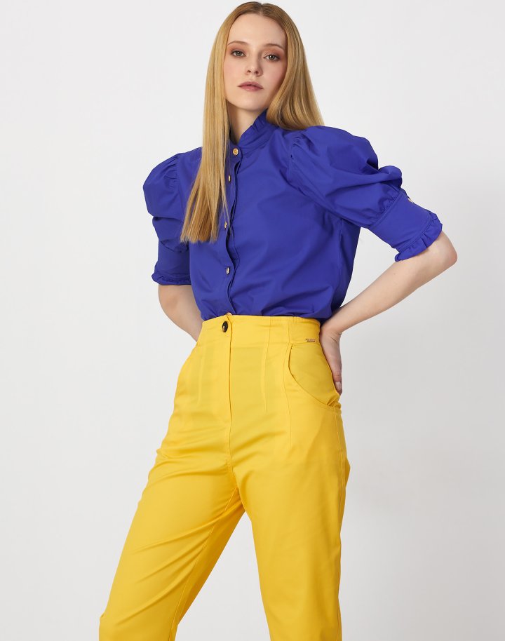 Trousers with turn up hems