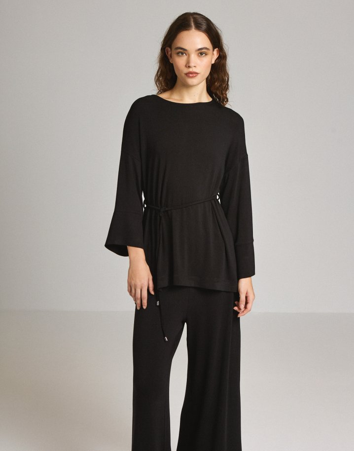 Oversized blouse with openings