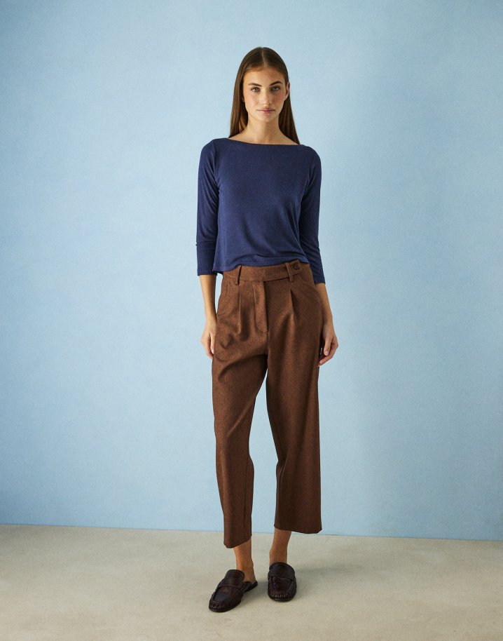 Trousers with slant pockets