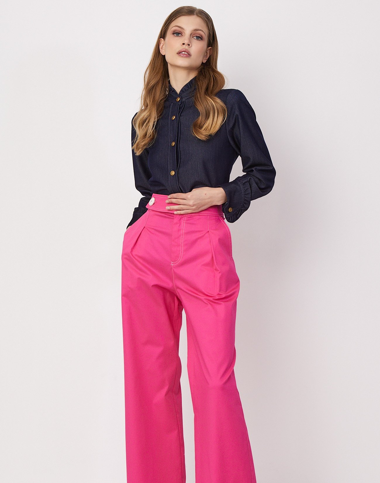 Trousers with button