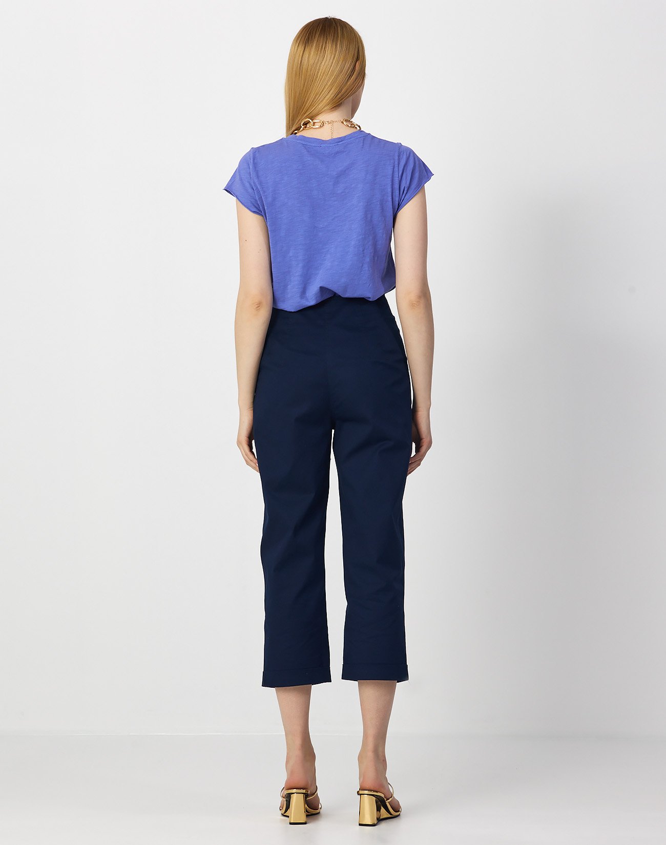 Trousers with turn up hems