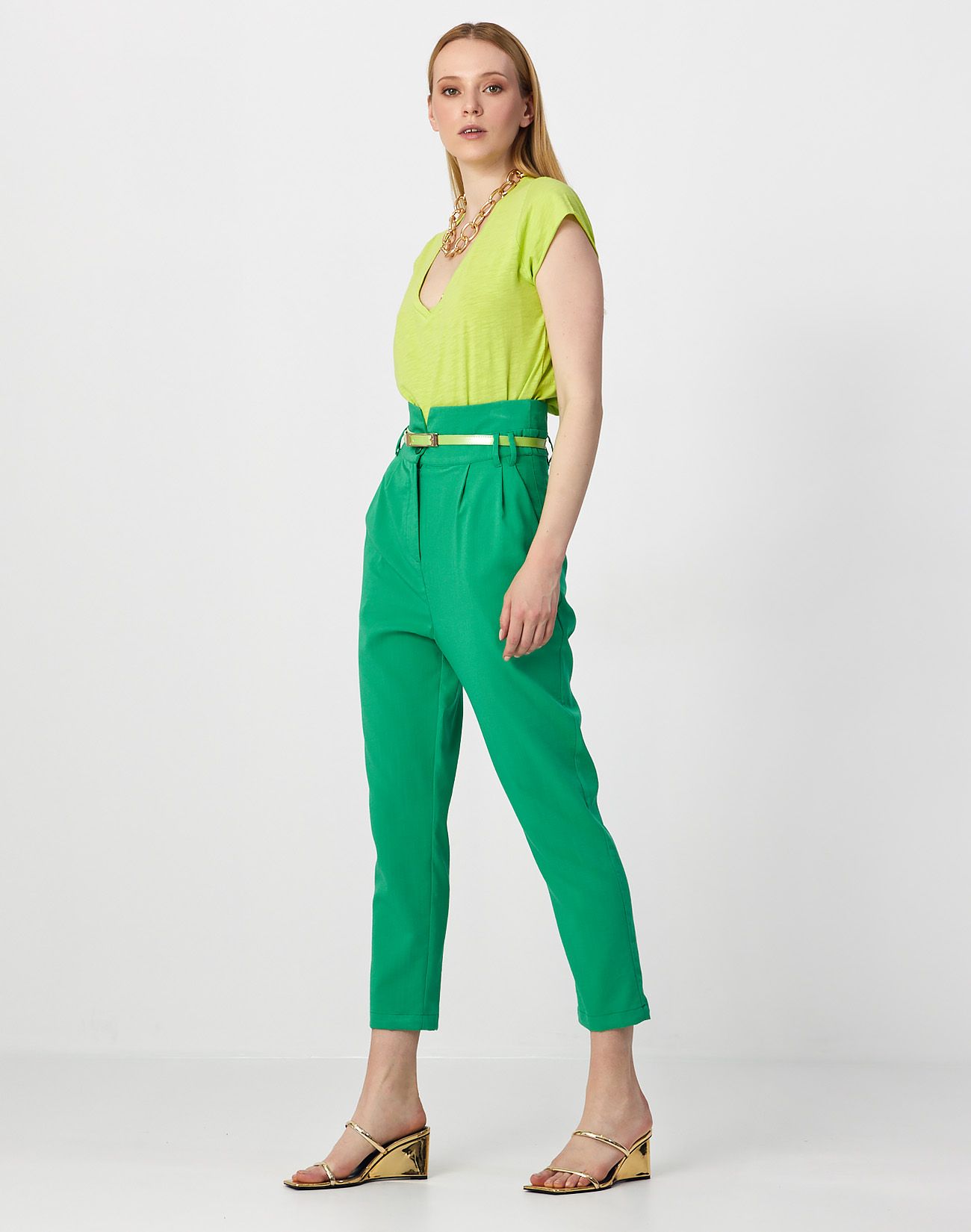 Trousers with pleating detail