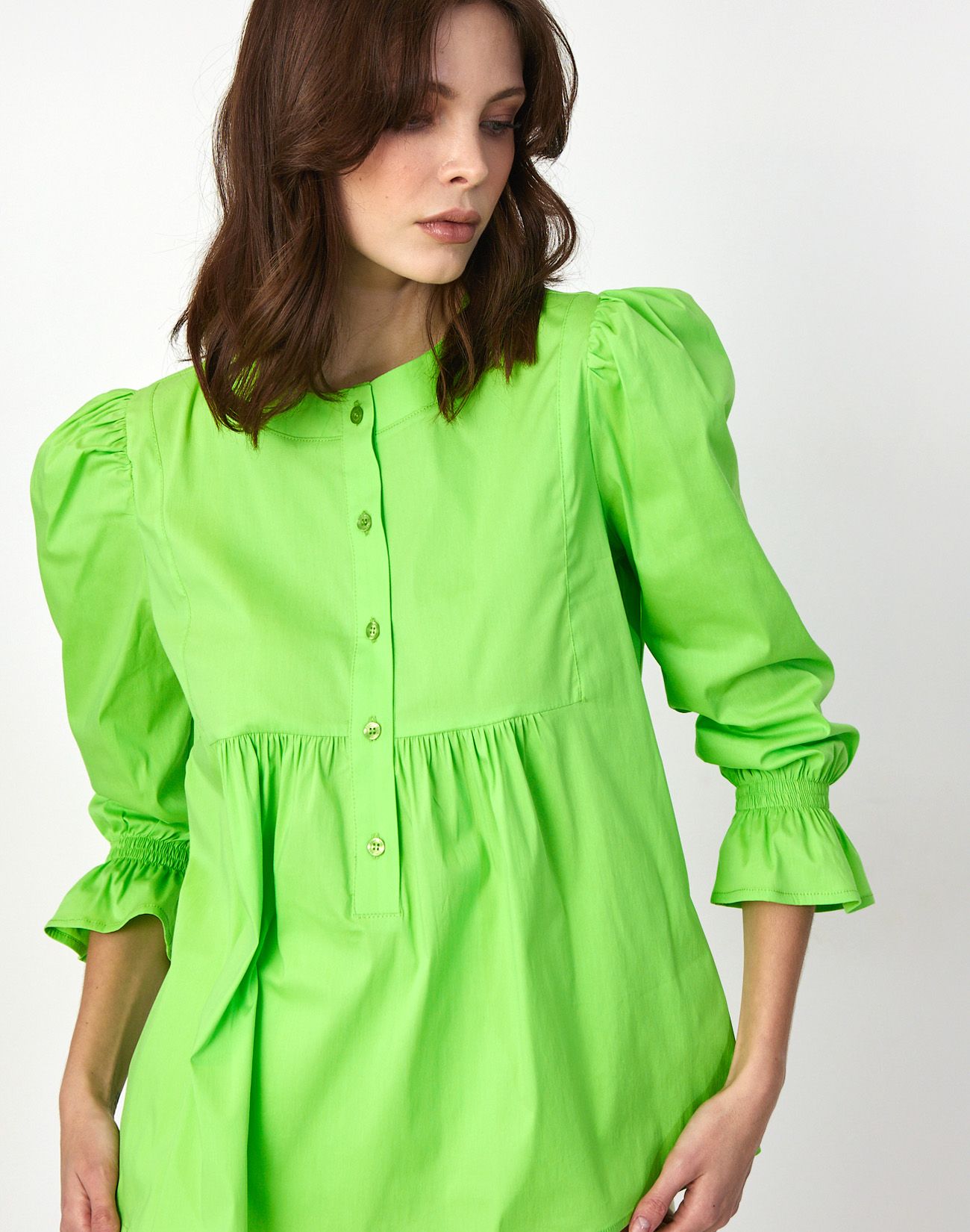 Shirt with pleating detail