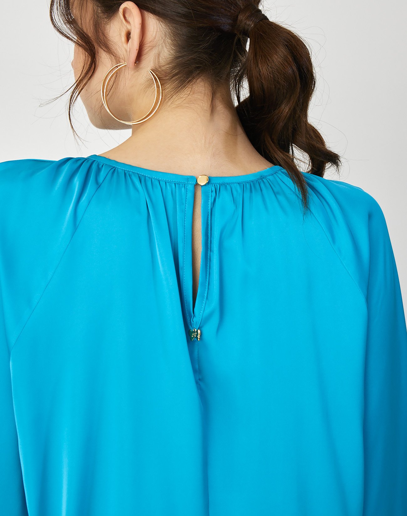 Satin top with pleating detail
