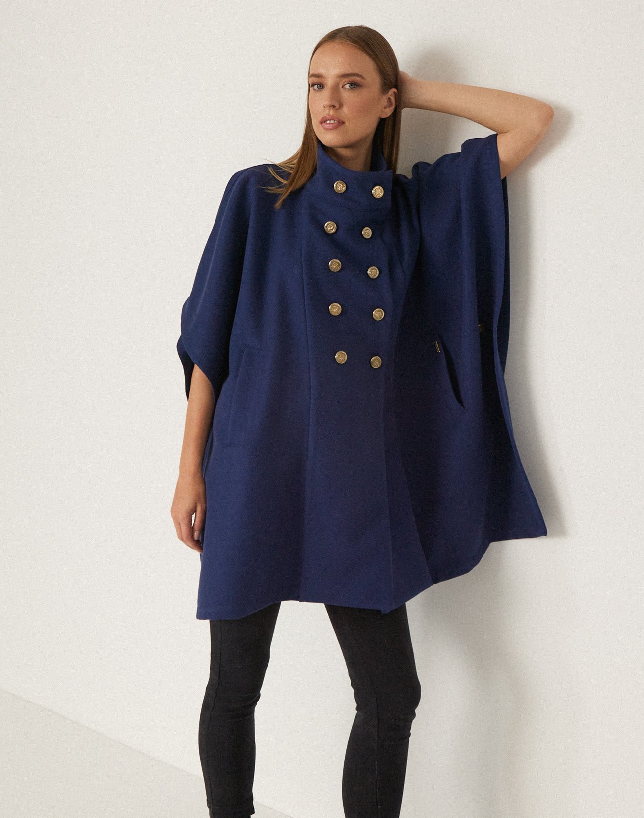 Cape with gold buttons