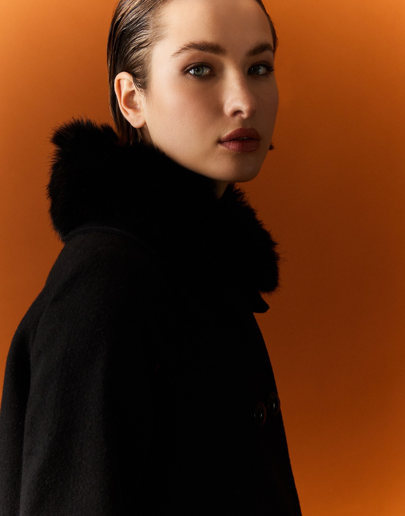 Coat with faux fur collar