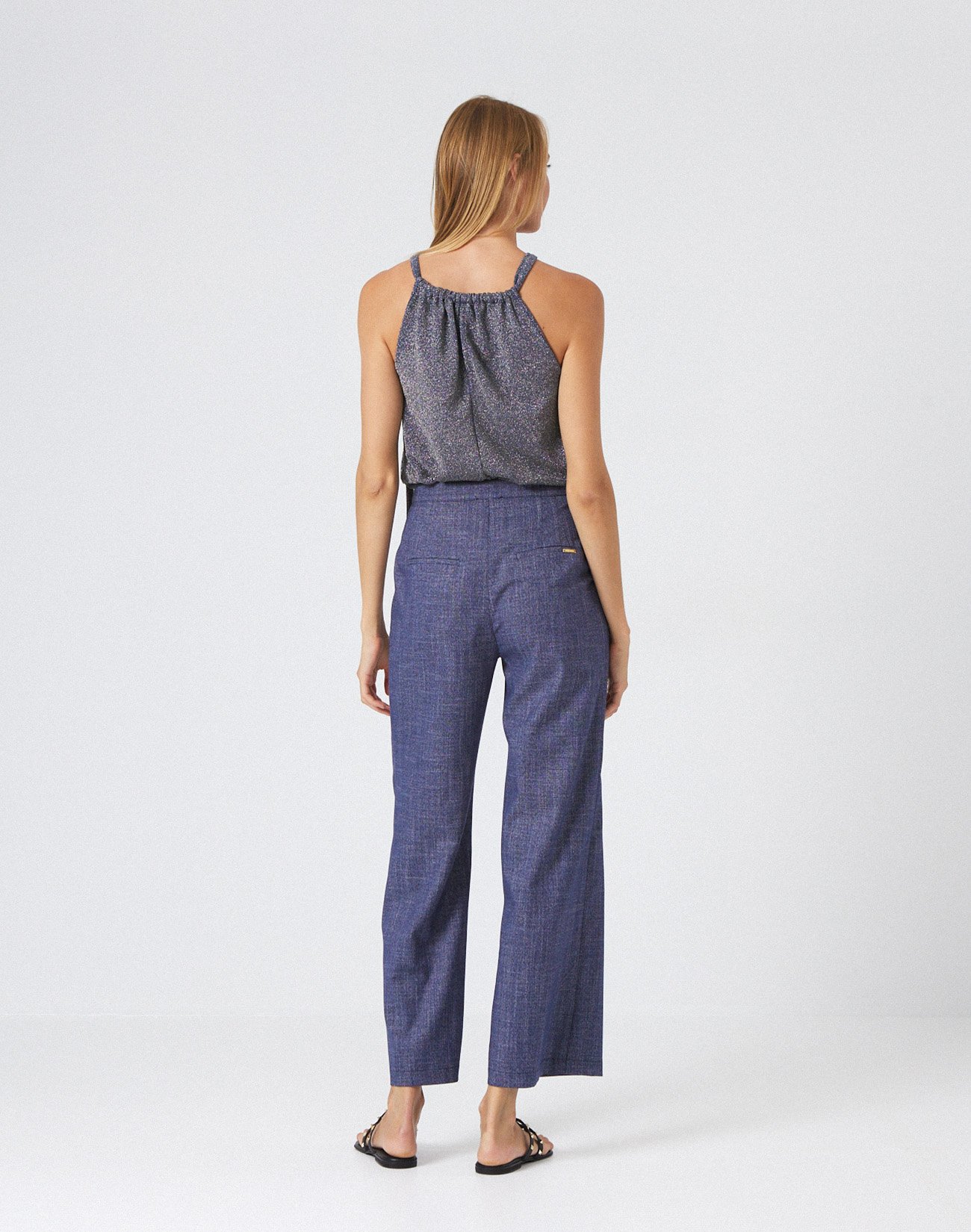 Trousers with pleating detail
