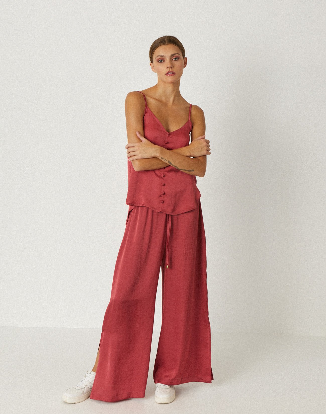 Trousers with openings