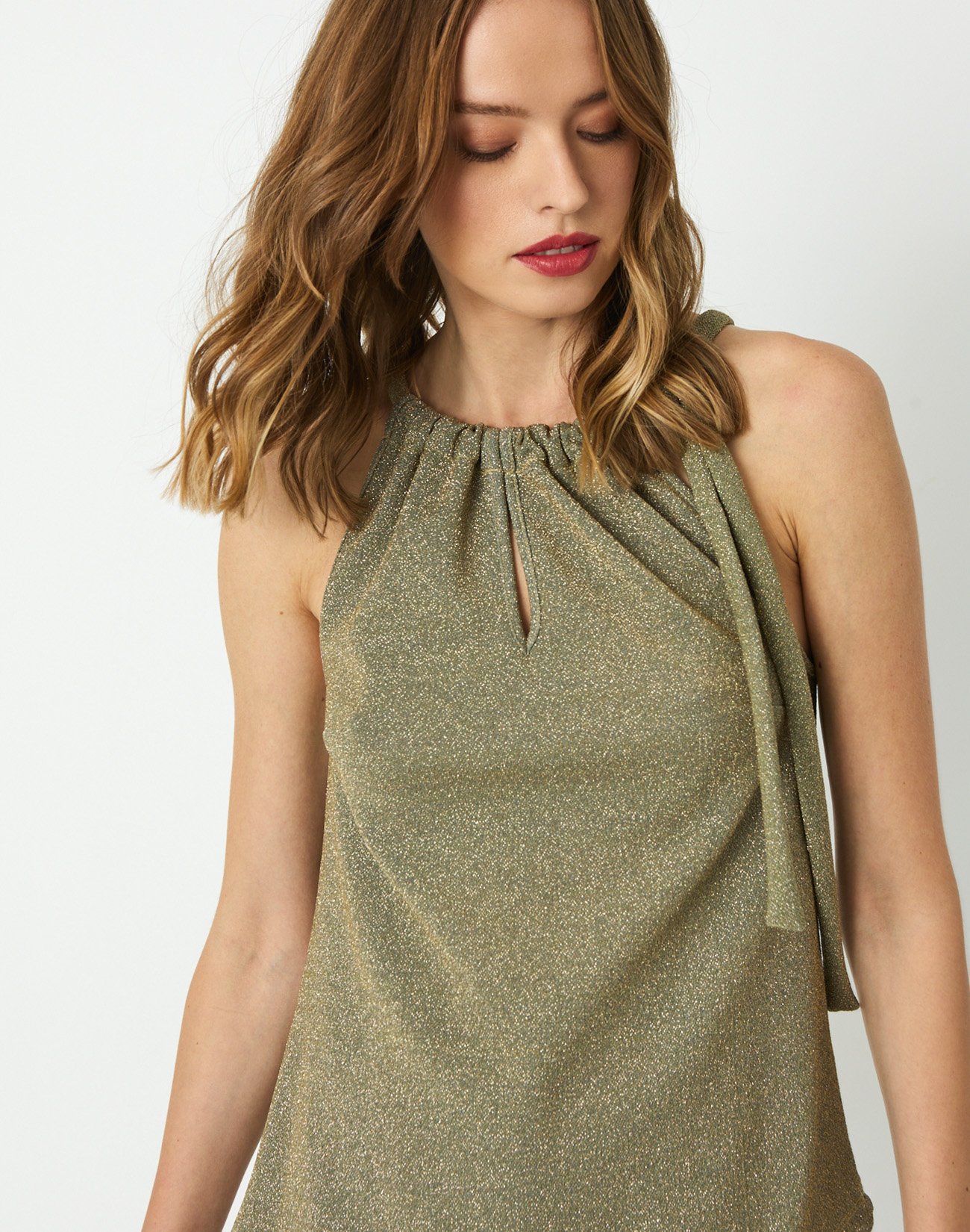 Top with metallic thread