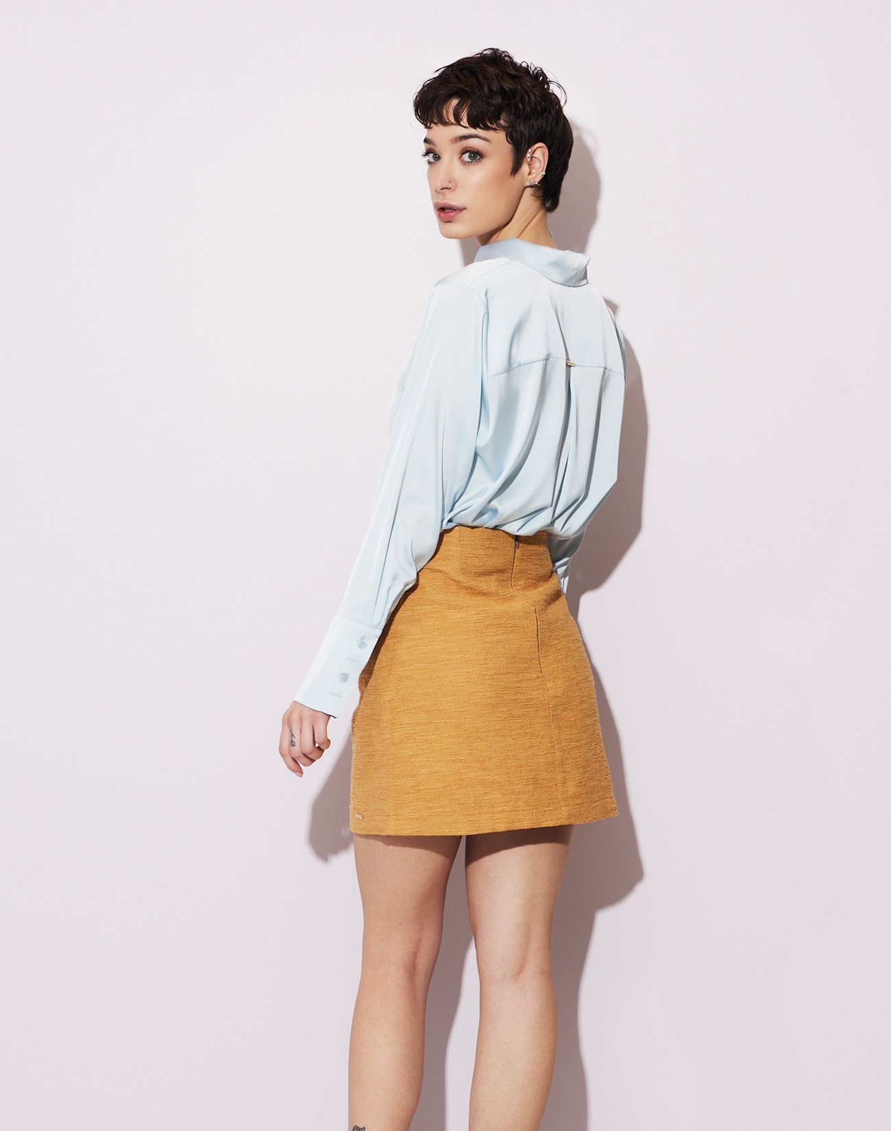 Mini skirt with button detail