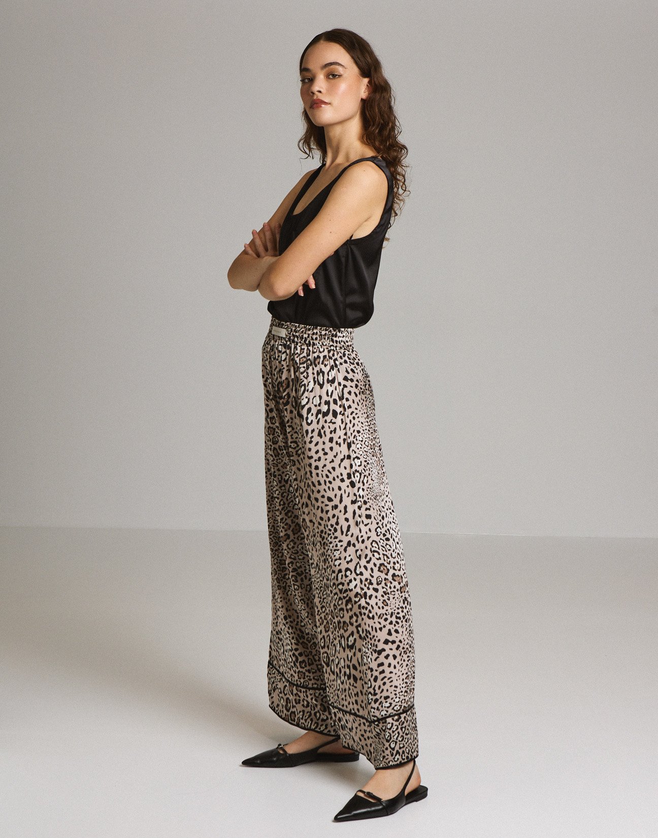 Animal print trousers with piping