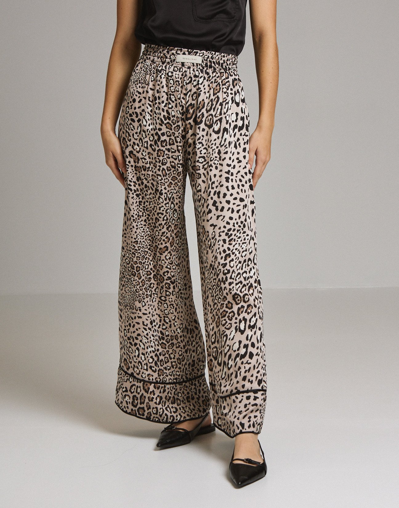 Animal print trousers with piping