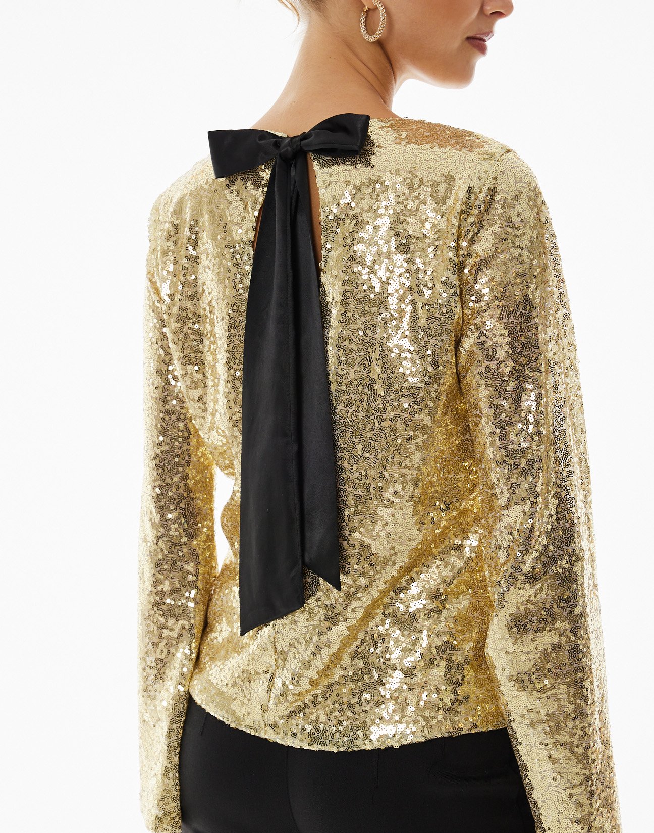 Sequinned blouse with tie