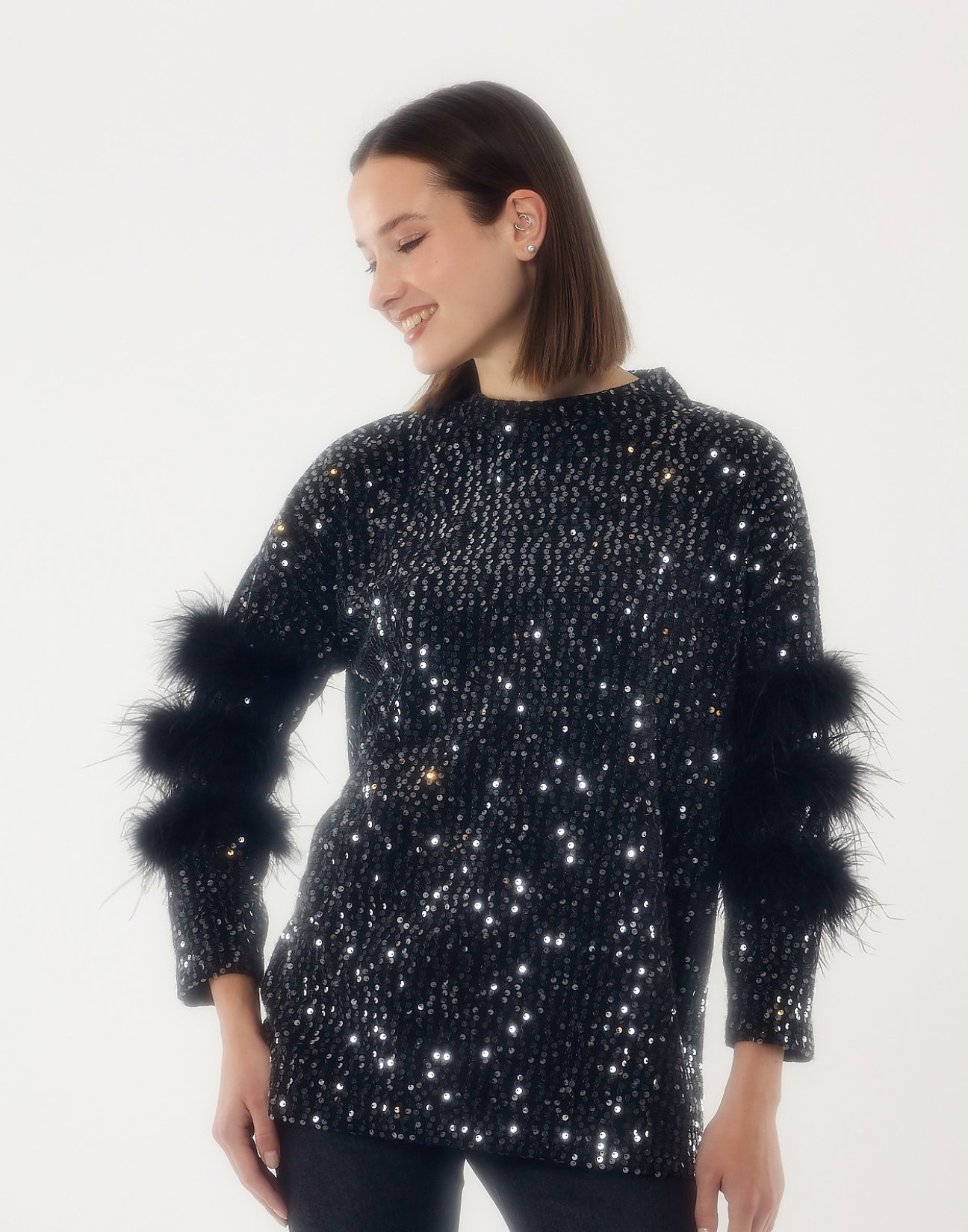 Sequinned  blouse with faux furs