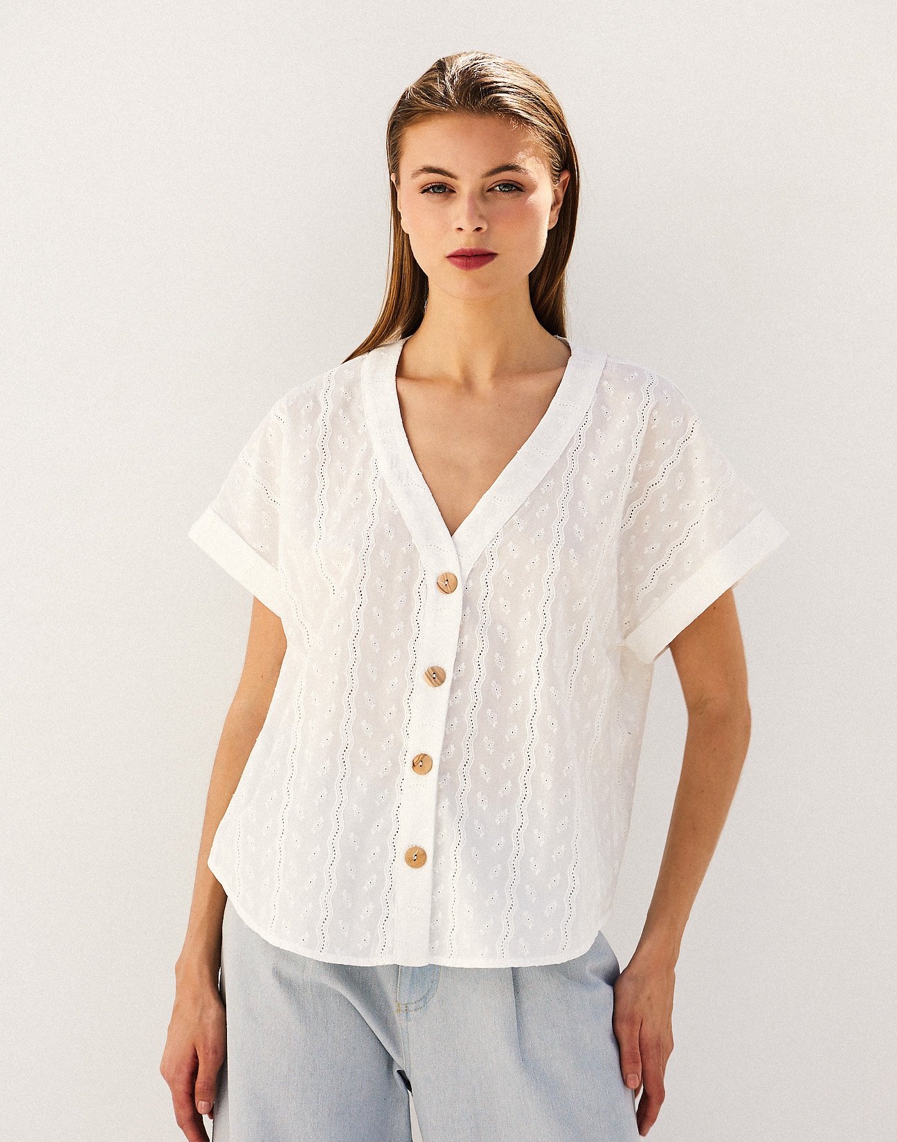 Shirt with cutwork embroidery