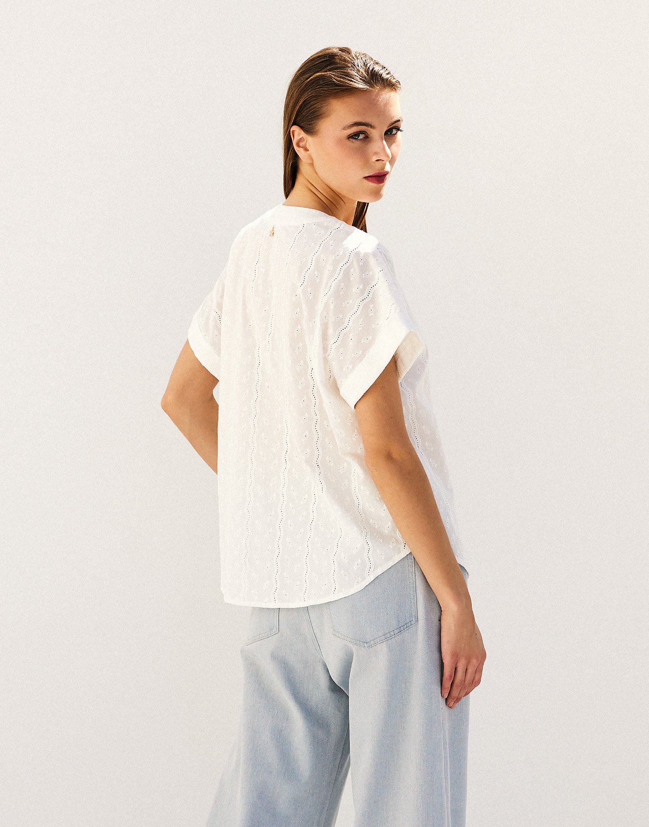 Shirt with cutwork embroidery