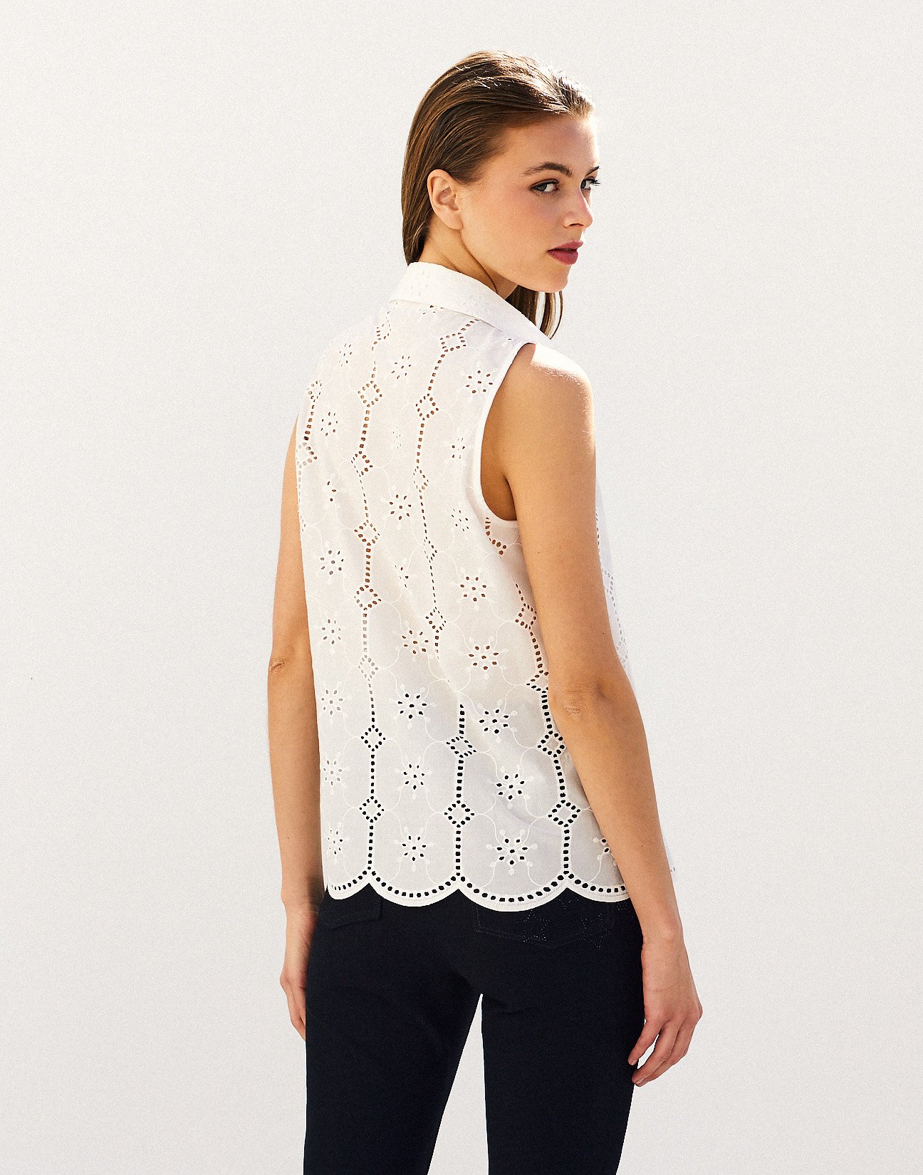 Top with cutwork embroidery