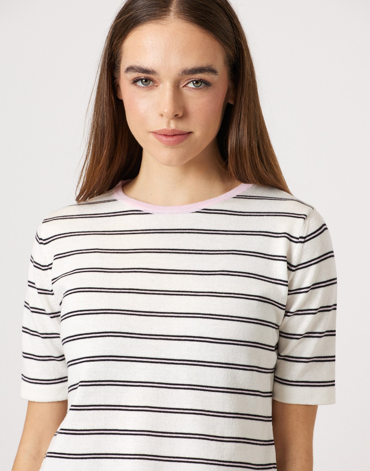Striped knit blouse with ruffles