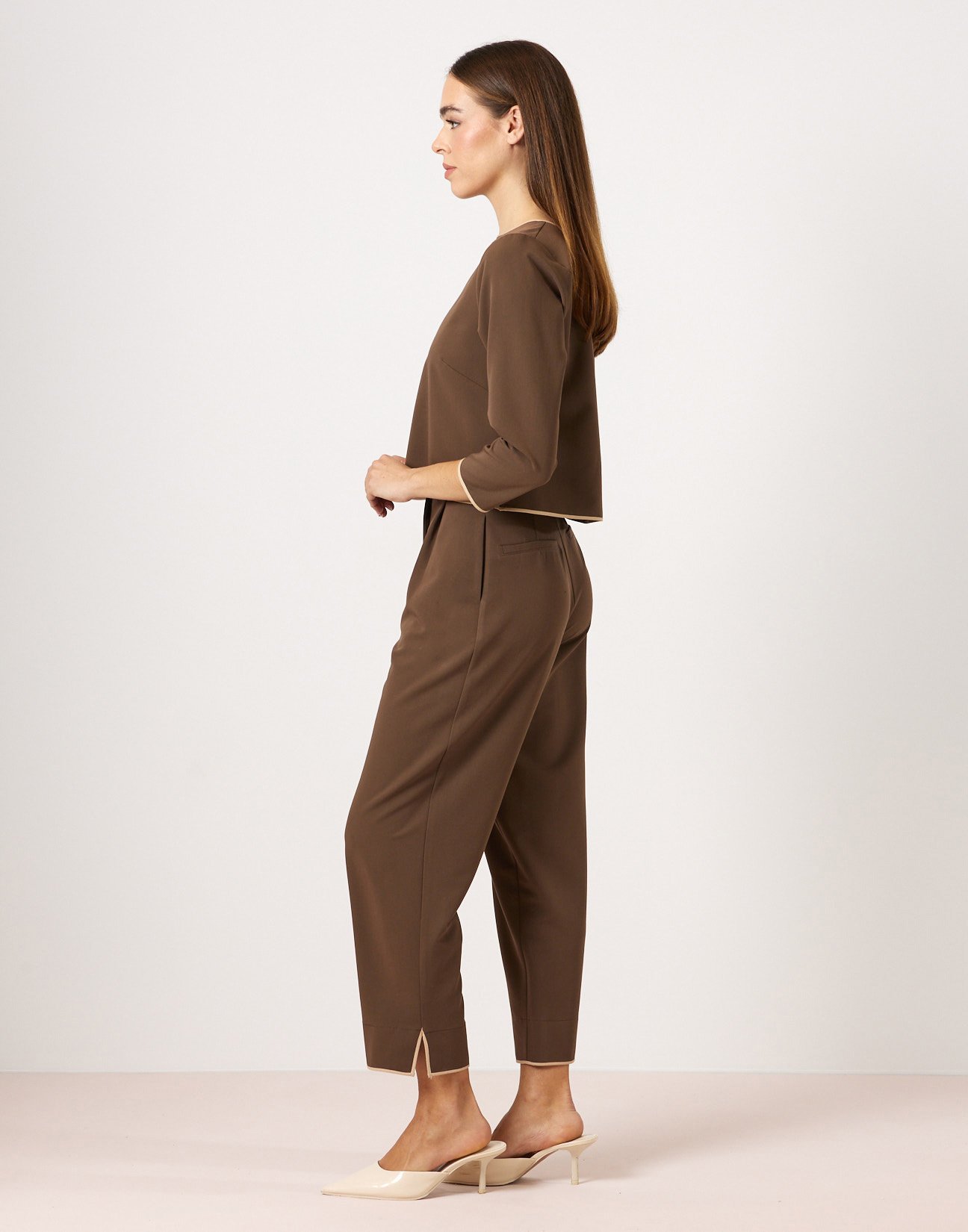 Trousers with piped seams