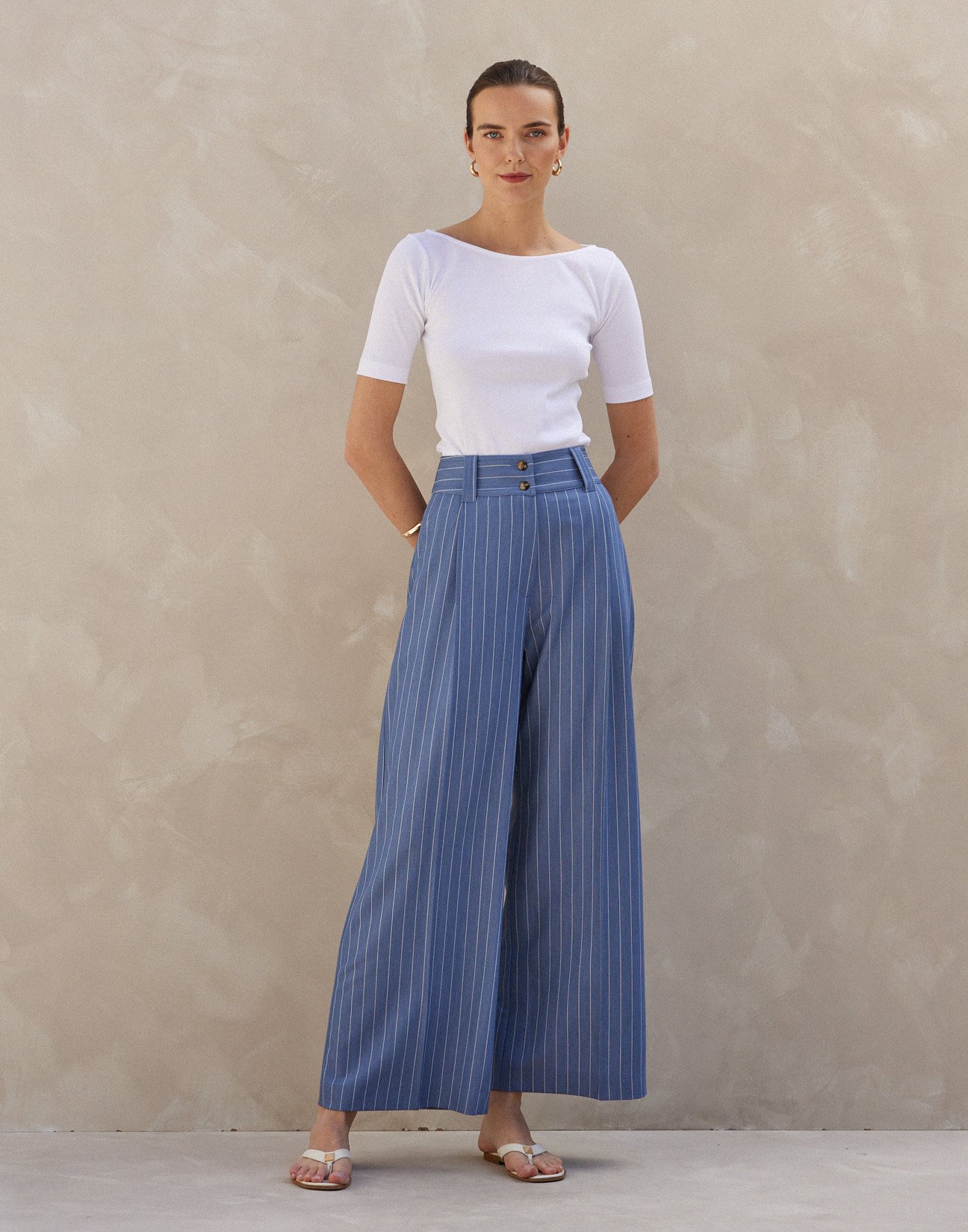 Pinstripe trousers with buttons