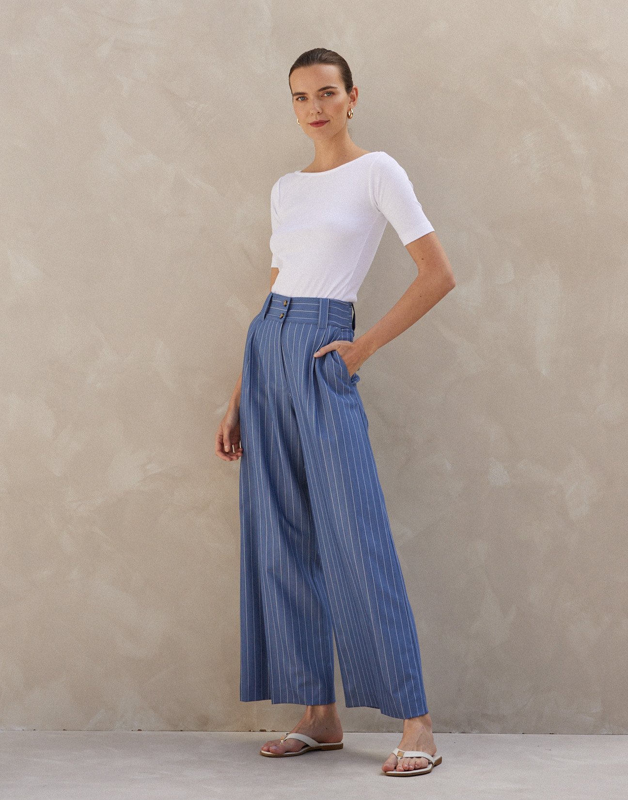 Pinstripe trousers with buttons