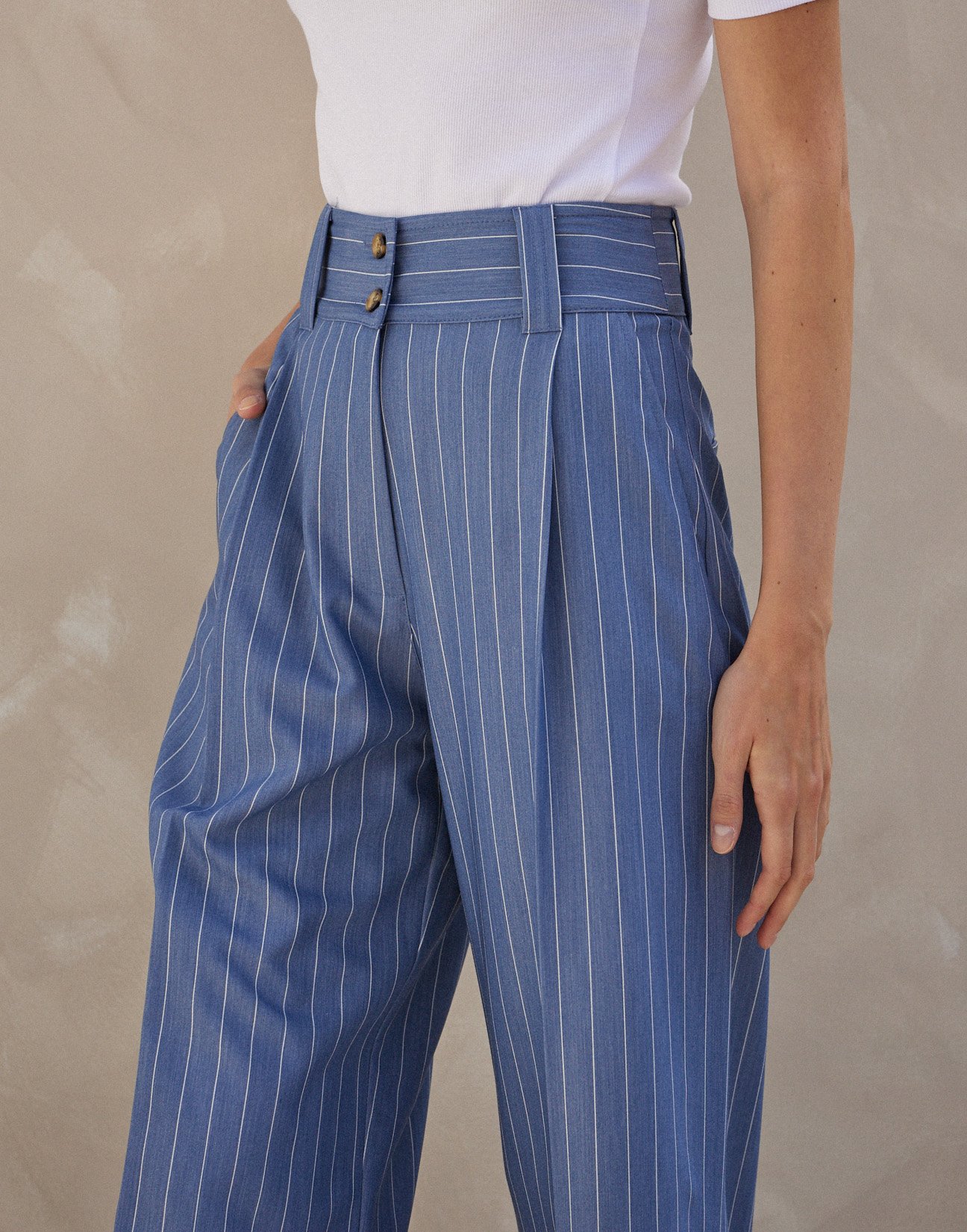 Pinstripe trousers with buttons