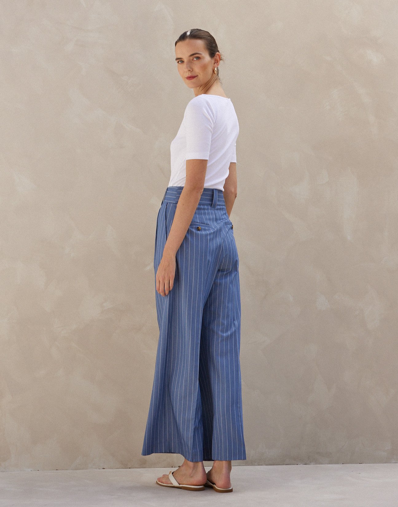 Pinstripe trousers with buttons