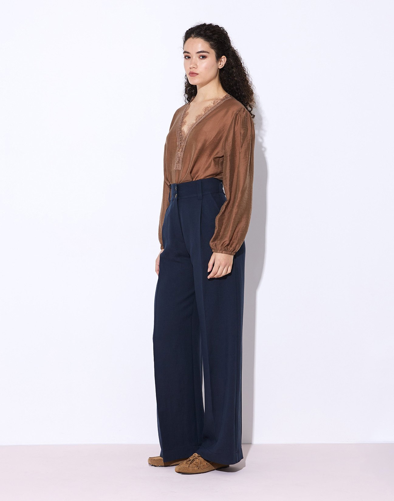 Trousers with buttons