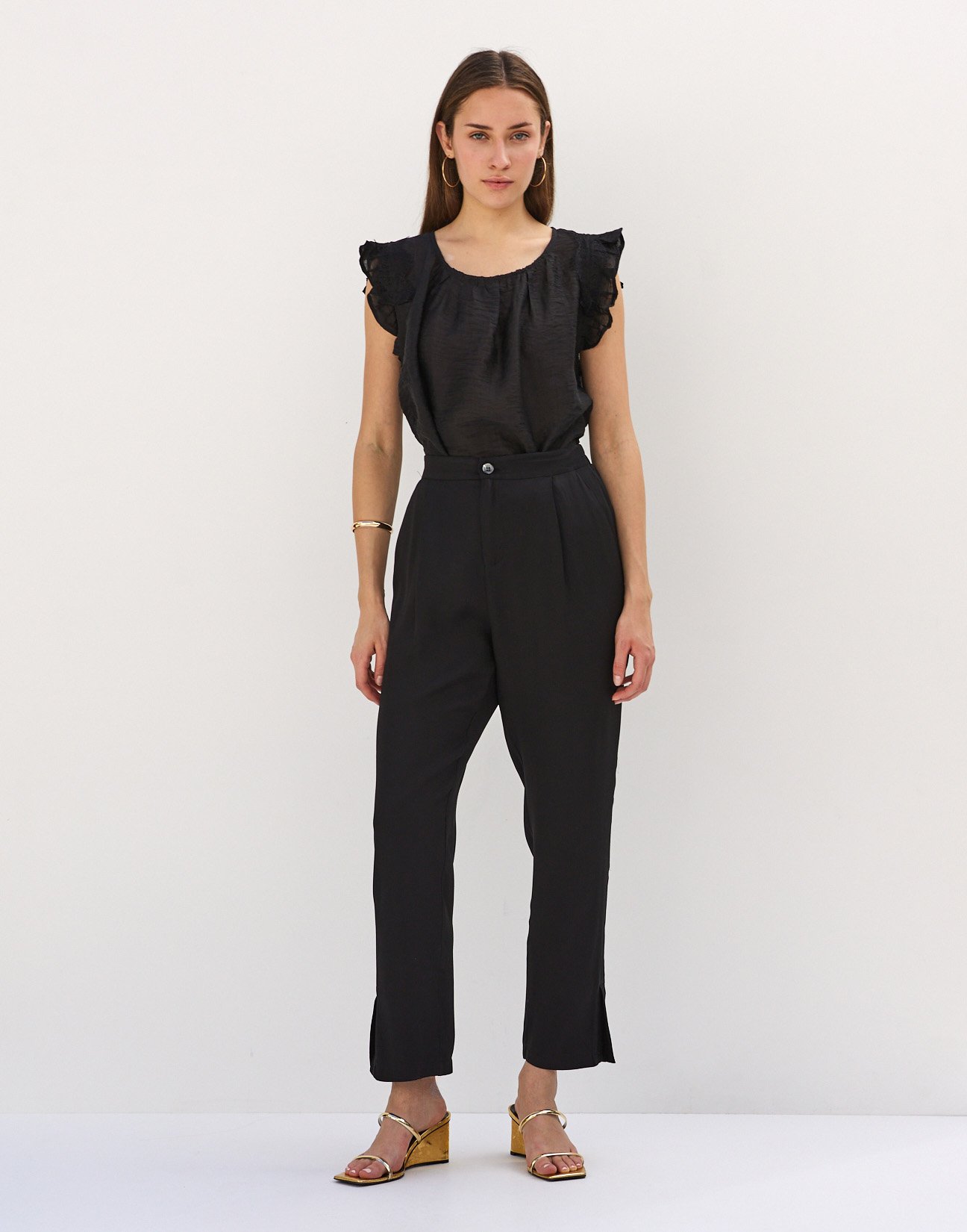 Trousers with slits