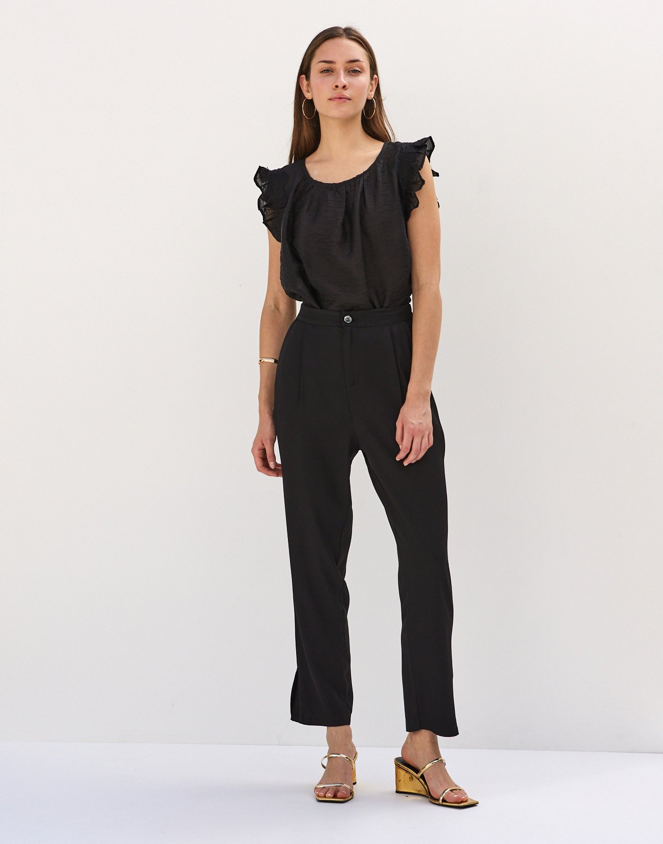 Trousers with slits
