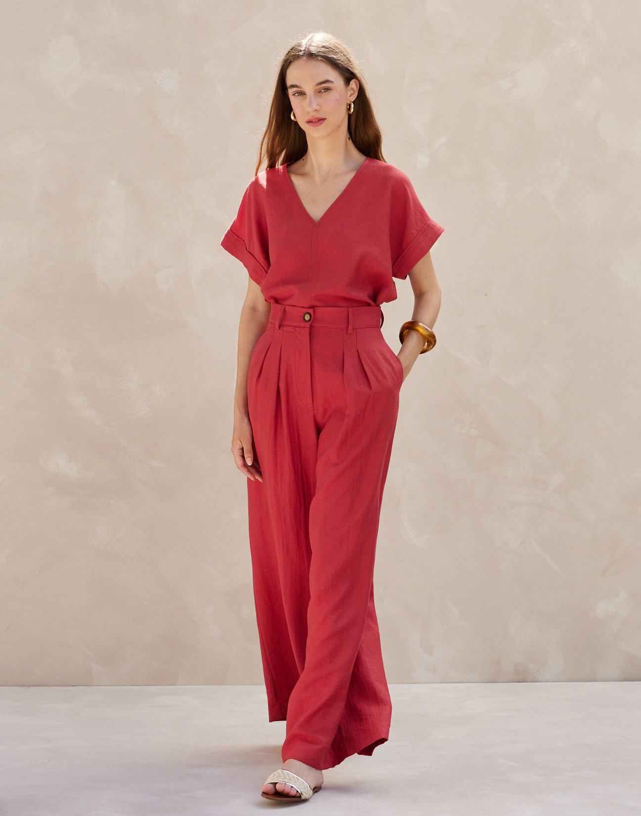 Trousers with pleats