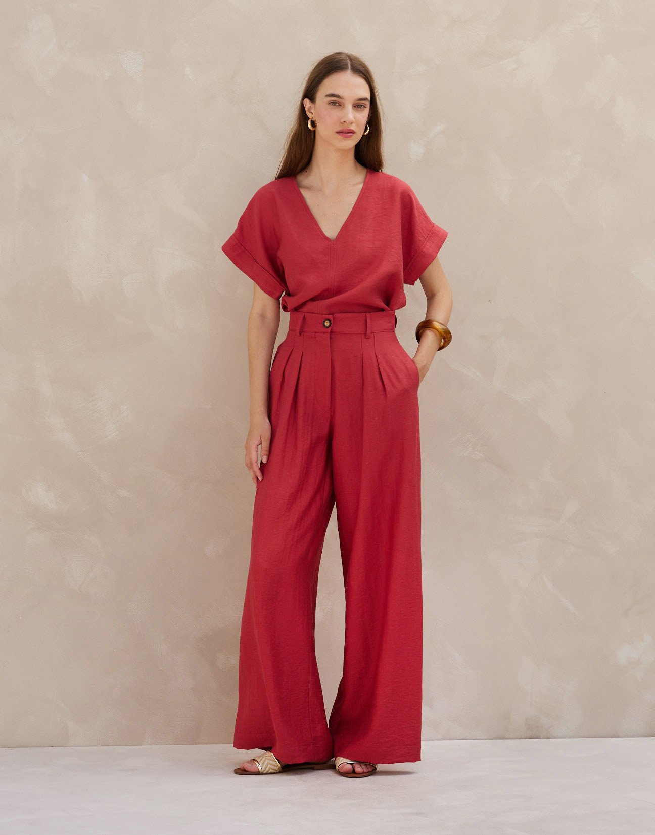 Trousers with pleats