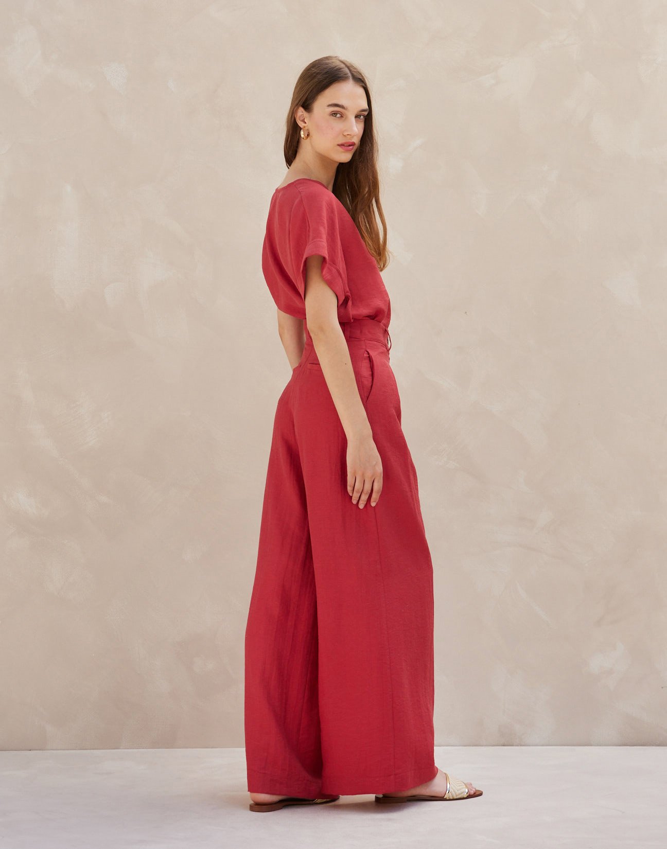 Trousers with pleats
