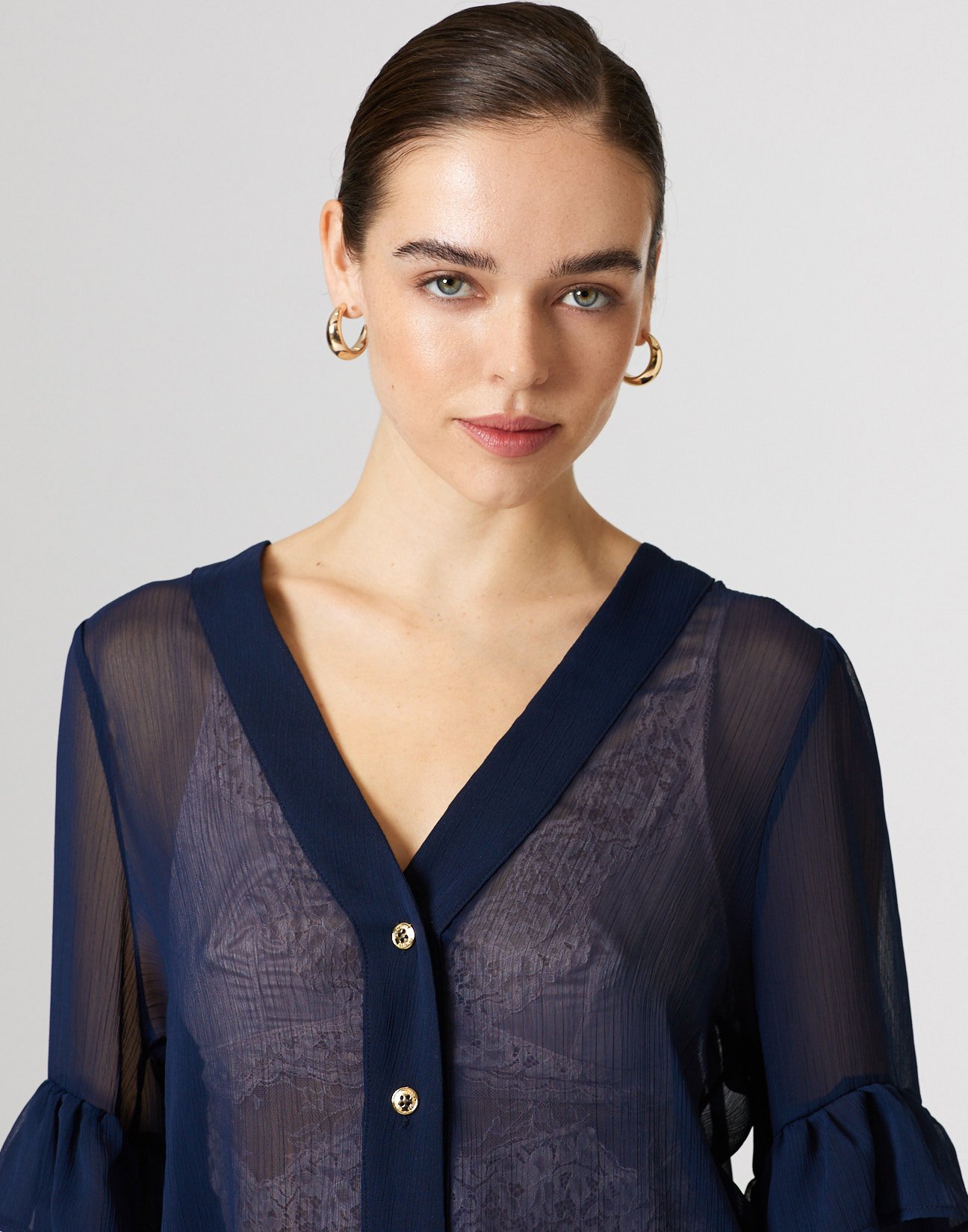 Shirt with ruffles detail