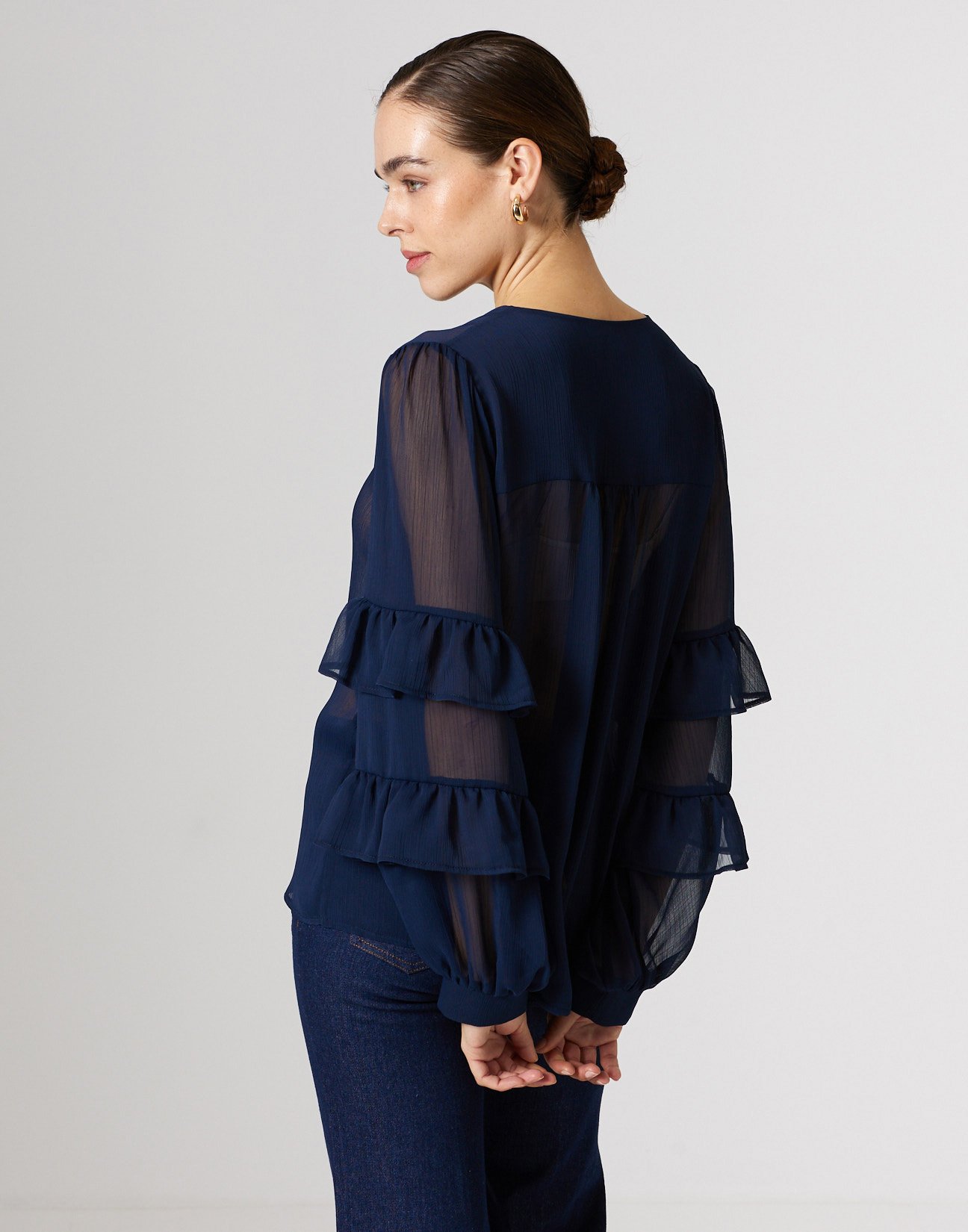 Shirt with ruffles detail