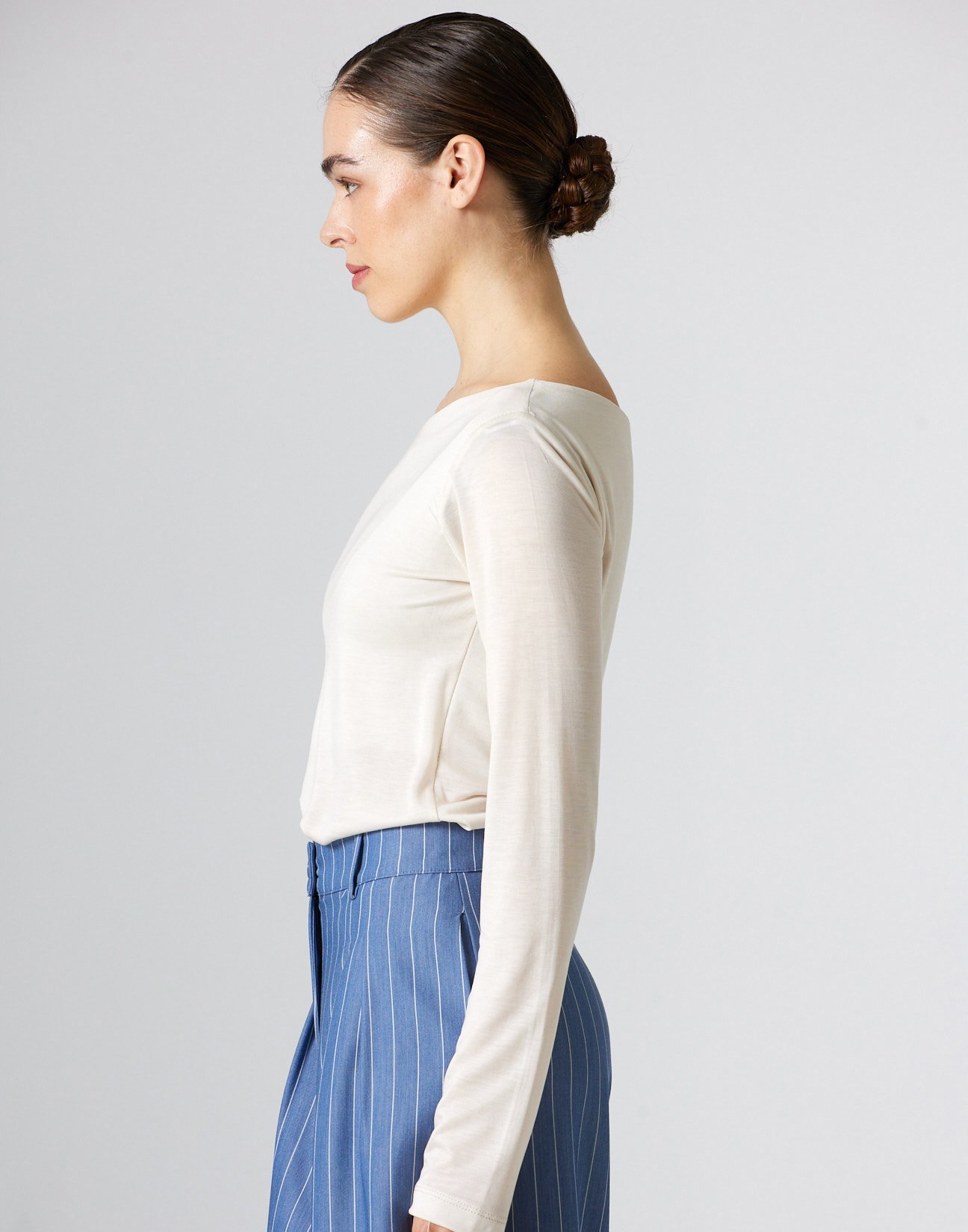 Top with asymmetric neckline