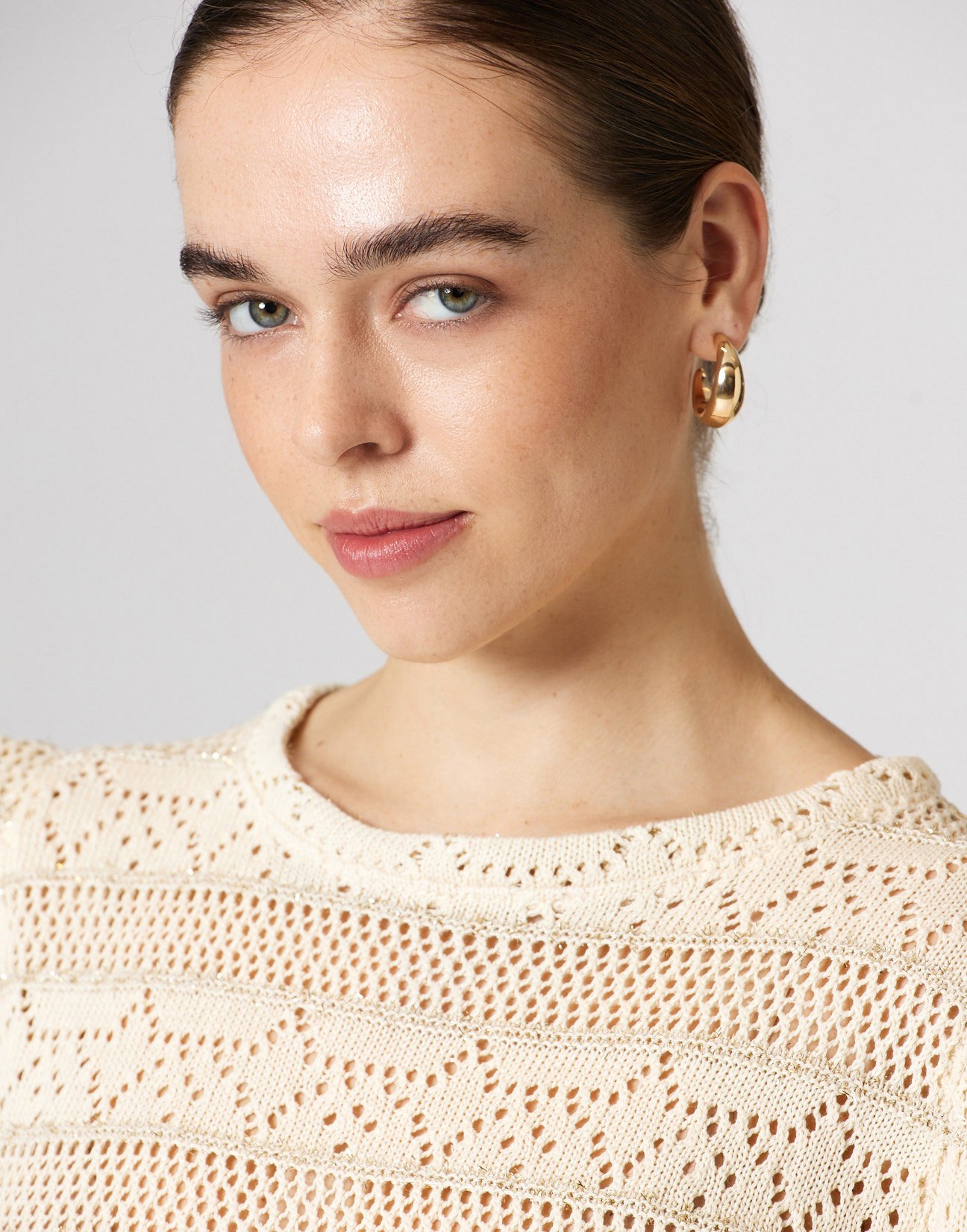 Cutwork knit blouse