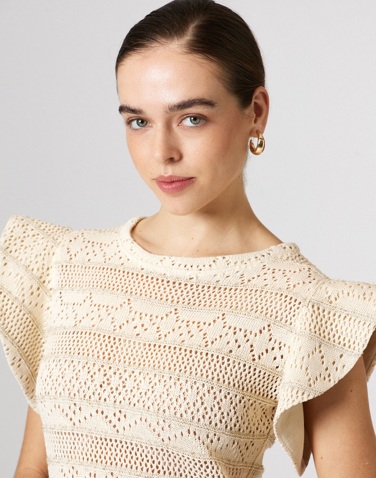 Cutwork knit blouse