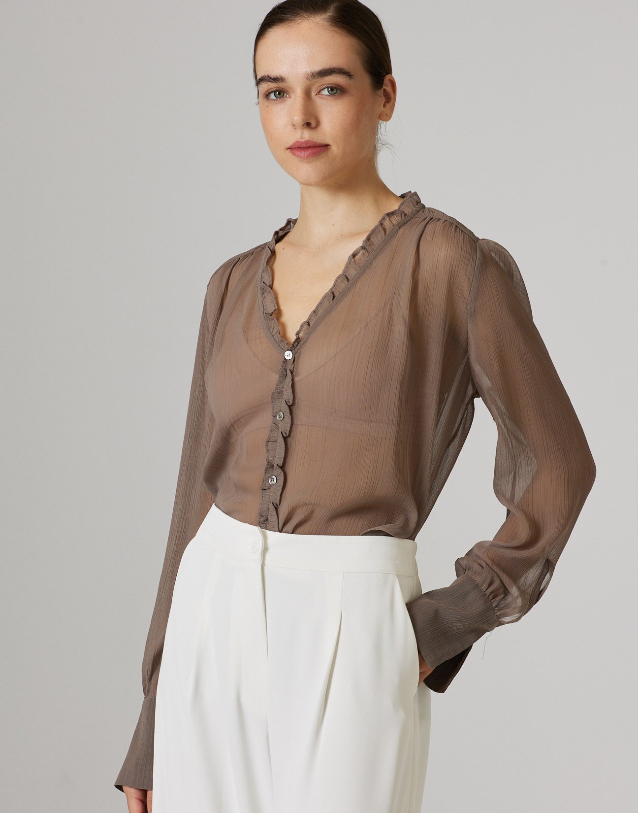 Semi sheer blouse with ruffles
