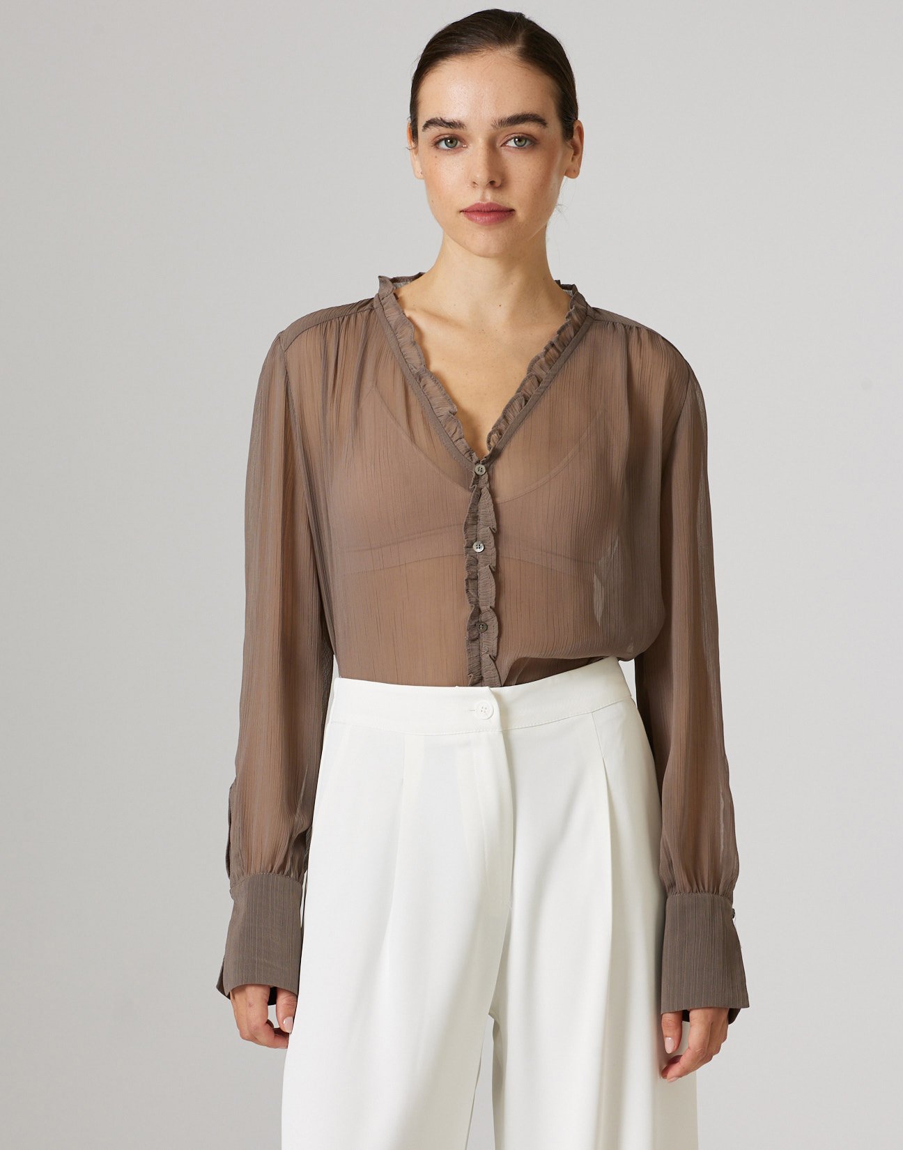 Semi sheer blouse with ruffles