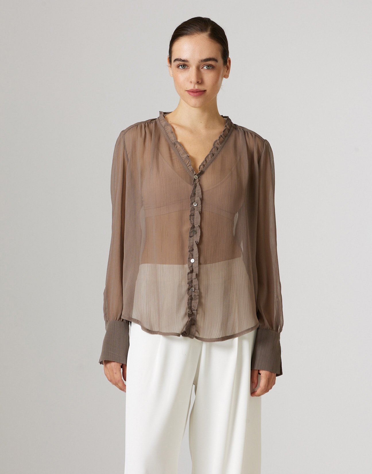 Semi sheer blouse with ruffles