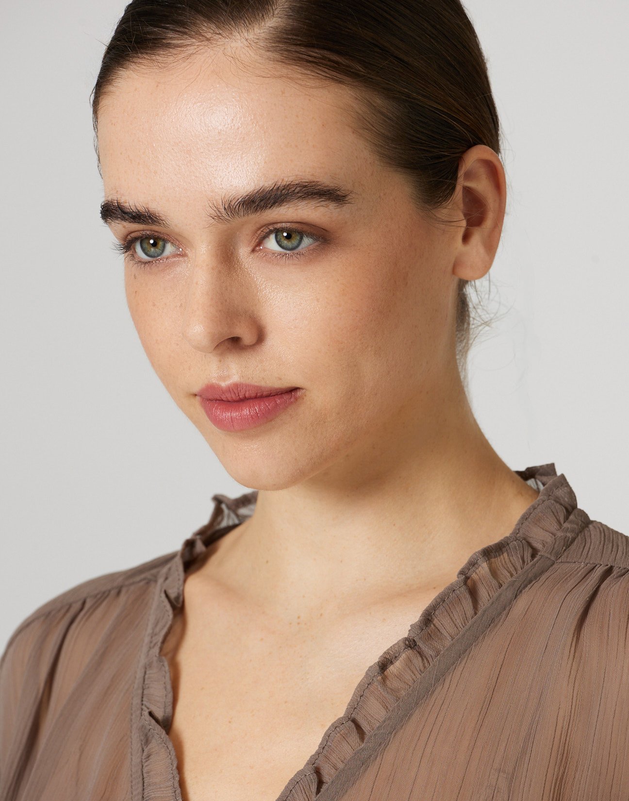 Semi sheer blouse with ruffles