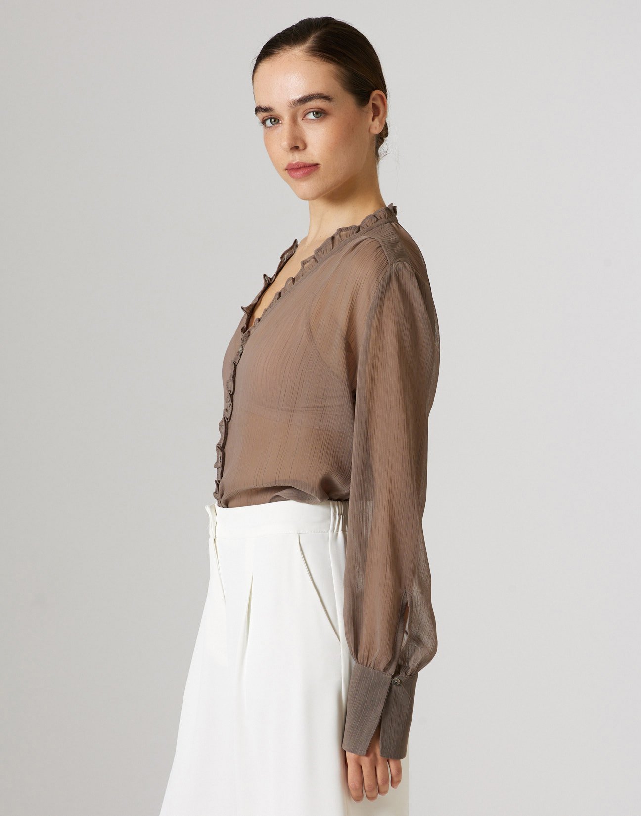 Semi sheer blouse with ruffles