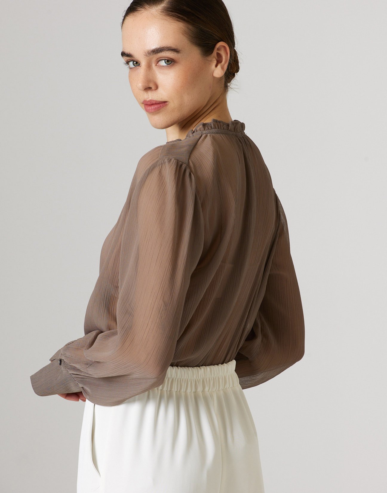 Semi sheer blouse with ruffles