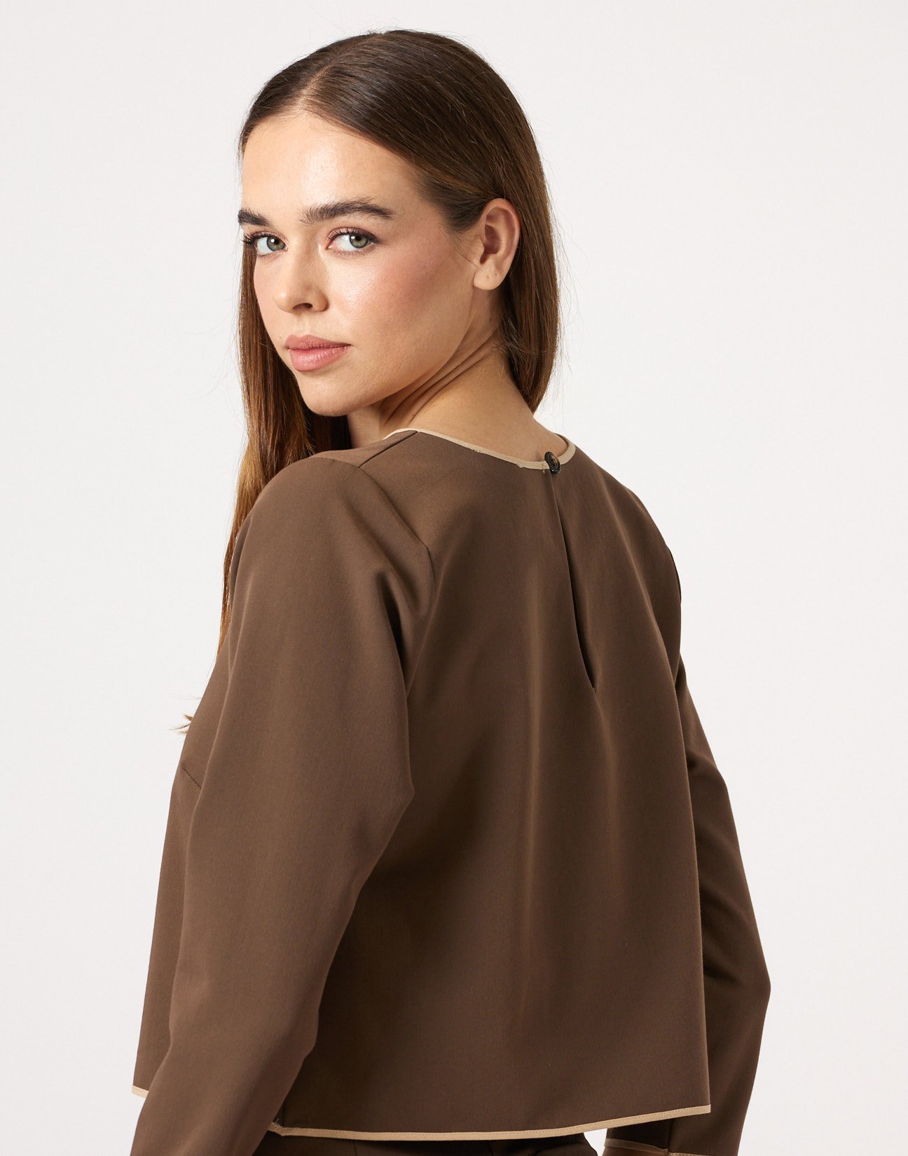 Blouse with piped seams