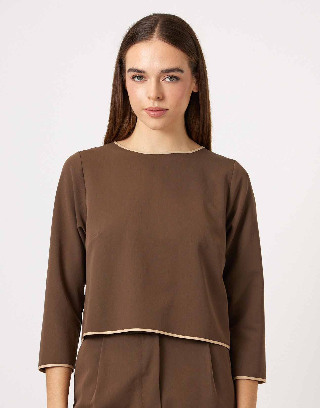 Blouse with piped seams