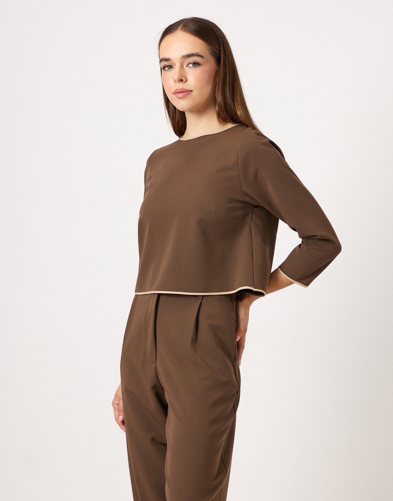 Blouse with piped seams