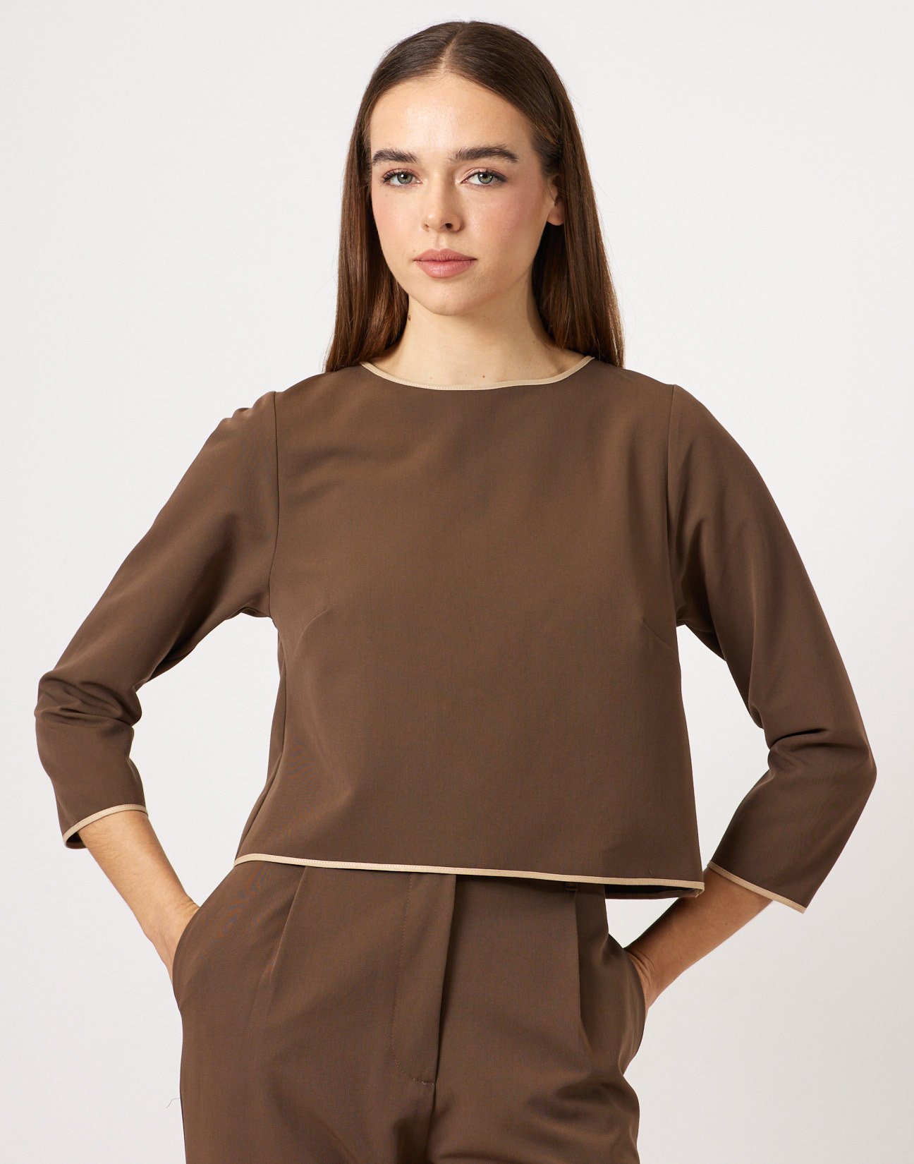 Blouse with piped seams