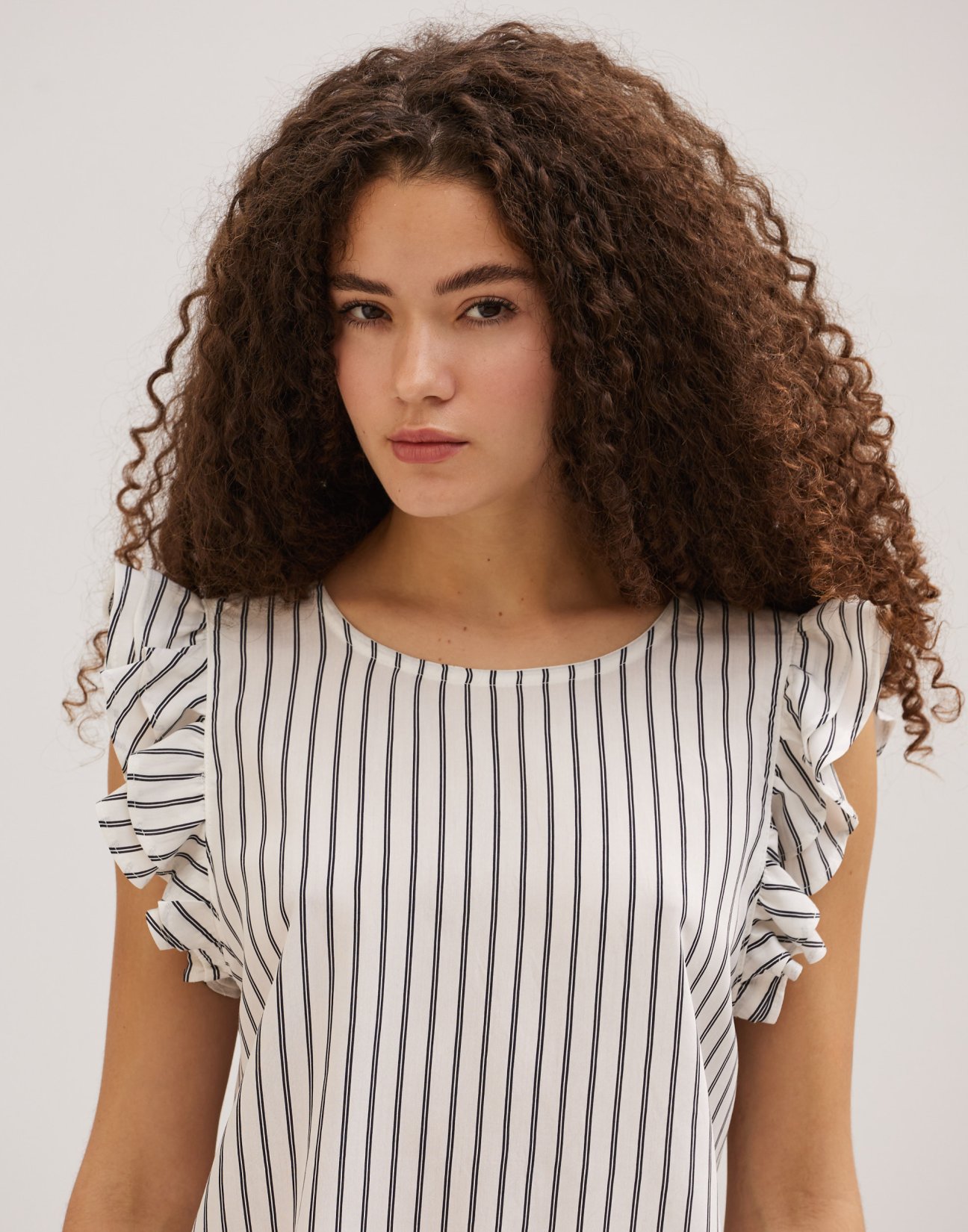 Striped blouse with ruffles