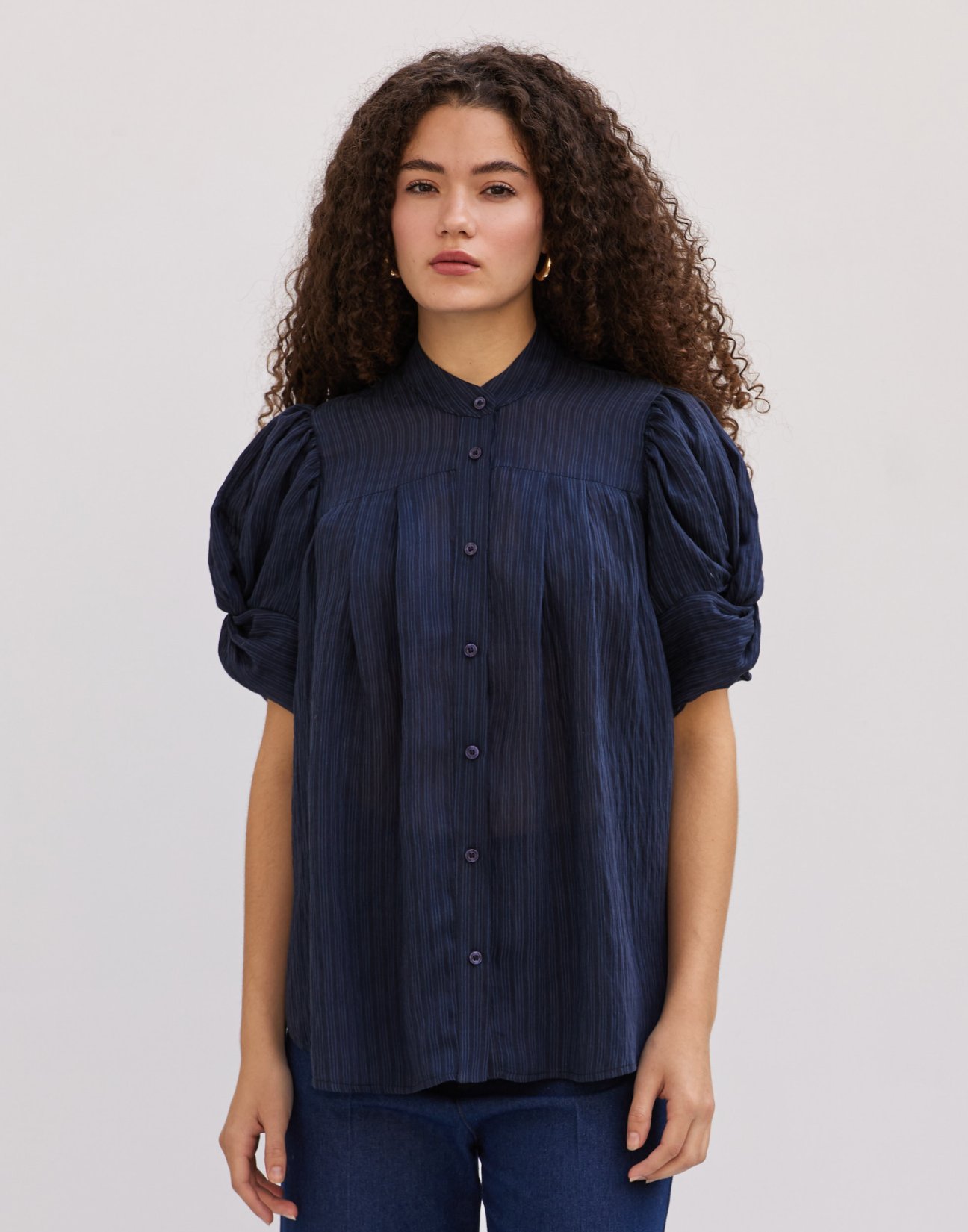 Striped shirt with knot